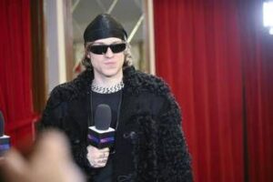 Sanremo 2025, Irama chi è: il Festival in ‘smart working’, i (numerosi) flirt e il significato dei tatuaggi